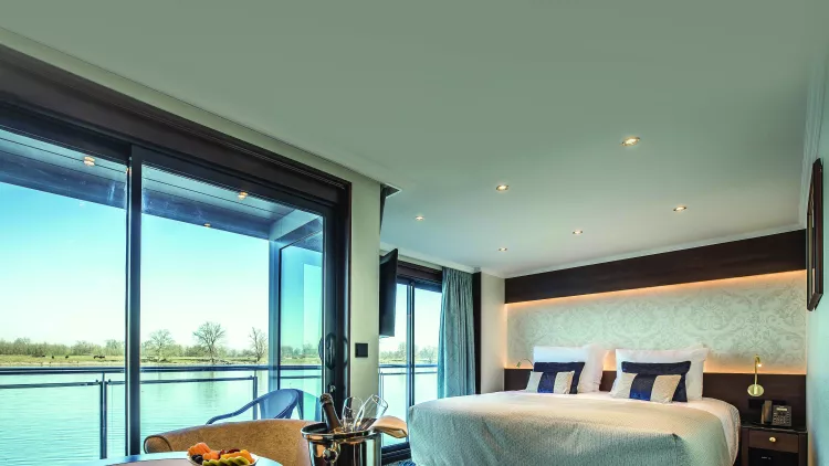 Interior of a cabin bedroom aboard the George Eliot cruise ship