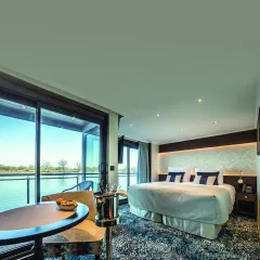 Interior of a cabin bedroom aboard the George Eliot cruise ship