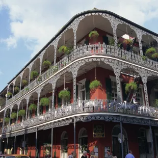 Exterior of the LaBranche House, traditional new orleans building featuring long balconies 