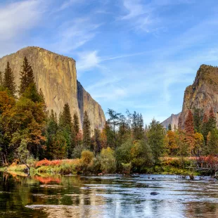 View of cliffs, trees and water in Yosemite National Park, California, USA