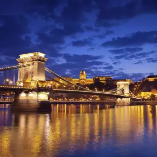 View of Budapest and chain bridge over the Danube river during twilight blue hour in Hungary