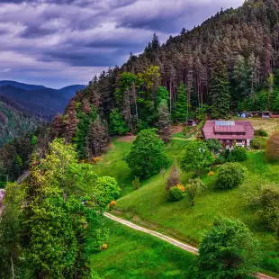 Aerial of the Black Forest with dark clouds in Schwarzwald, Germany