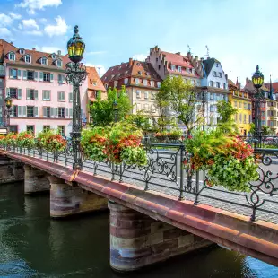 Pretty bridge across a waterways of Strasbourg, capital city of the Alsace region, France