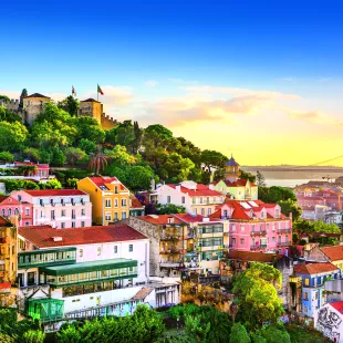 Old town cityscape skyline at dusk in Lisbon, Portugal