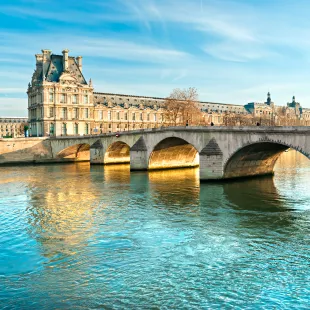 Pont Royal bridge spanning across the river Seine before the Louvre Museum