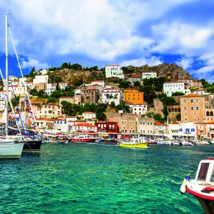 View of port with colourful boats on Hydra island in Saronic, Greece