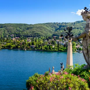 Isola Bella island and Lake Maggiore with statue and garden in Italy