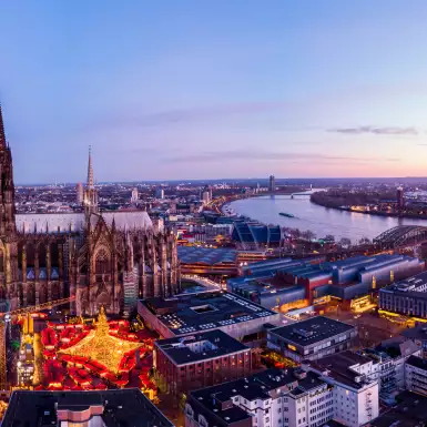 Aerial shot of the Cologne Christmas Markets during sunset in Germany