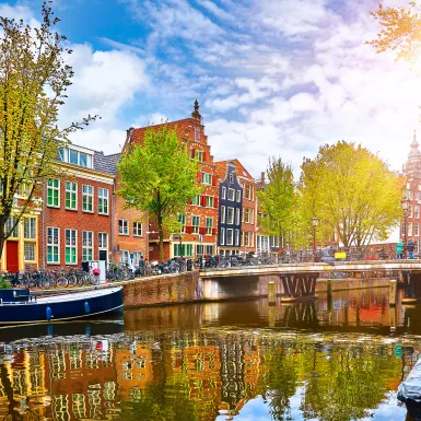 Netherlands houses overlooking the river Amstel canal in Amsterdam