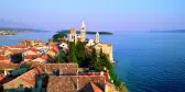 Elevated view of medieval Rab Bell Towers and town, Rab Town, Rab Island, Dalmatia, Dalmatian Coast, Croatia, Europe