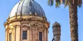 Exterior of the Palermo Cathedral with statue in Sicily, Italy