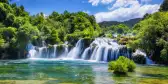 Croatian Krka Park waterfalls surrounded by green trees