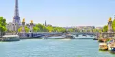 The Seine river with Alexandre III bridge and Eiffel Tower in the background