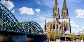 Cologne Cathedral and bridge on a beautiful summer day in Cologne, Germany