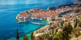 Aerial view of Dubrovnik city with old town houses and beautiful sea waters