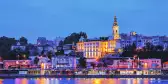 Belgrade at night with it's colourful town lights reflecting in the river Sava 