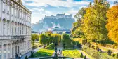 Beautiful view of famous Mirabell Gardens with the old historic Fortress Hohensalzburg in the background in Salzburg, Austria