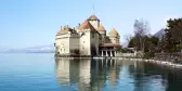 View of the château de Chillon with adjacent rocky beach in Switzerland