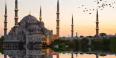 Grand Mosque against the clear blue sky in Istanbul, Turkey