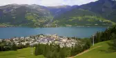 View of Lake Zell and the town of Zell am See from the overlooking green hills