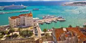 Aerial view of Split's harbour and buildings with distant cruise ships in Dalmatia, Croatia