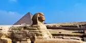 Great sphinx with the pyramid in the background, Giza, Egypt