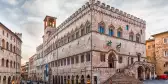 View of Palazzo dei Priori, historical building in the city centre of Perugia, Italy.