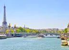 The Seine river with Alexandre III bridge and Eiffel Tower in the background