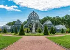 Ornate glass house and topiary in Parc de la Tete d'Or, Lyon, Grance