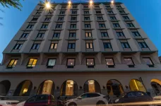 Exterior of the Catalunya Hotel during the evening in Alghero, Italy