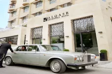 Old silver car in the entrance way to the Alqasr