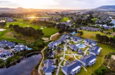 Aerial shot of Pearl Valley Hotel by Mantis and the surrounding green landscape, South Africa