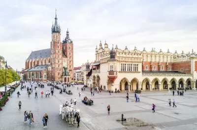 Distant view of Kraków Cloth Hall and it's exterior streets