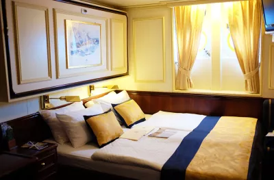 Double bed inside a room on the clipper