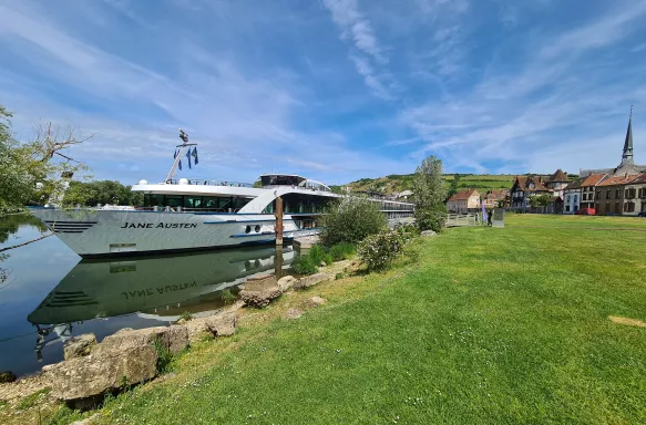 View of the Jane Austen cruise ship from shore at Les Andelys, France.