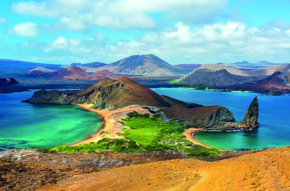 Bartolome Island surrounded by beaches and green glistening waters