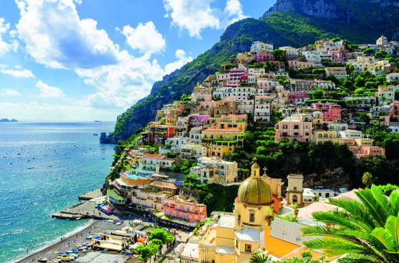 Colourful buildings on the side of the Amalfi Coast in Positano village, Italy