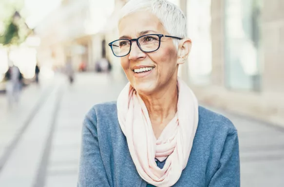 Portrait of Happy Senior Lady on the city street