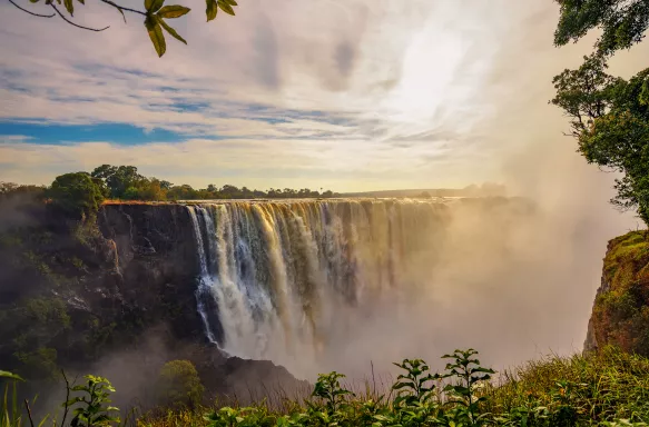 Sunset at the Victoria Falls on Zambezi River in Zimbabwe, Africa.