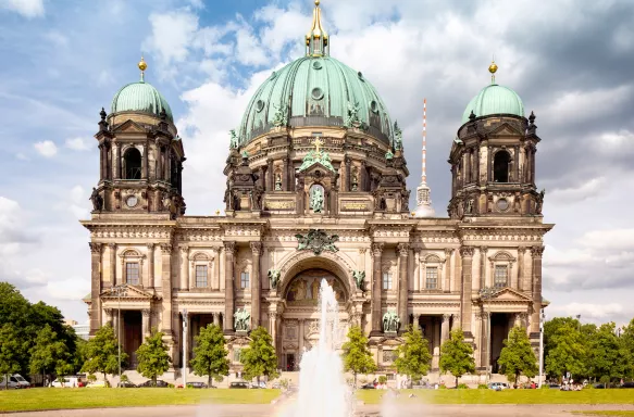 Façade of the Berlin Cathedral with dramatic sky in Germany