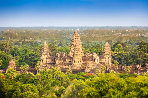 View over tropical forest and the Angkor Thom Temple in Siem Reap, Cambodia