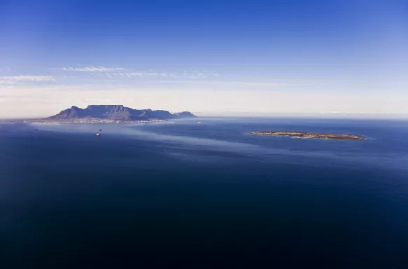 Aerial view of Robben Island with Table Mountain in the distance, Cape Town, South Africa