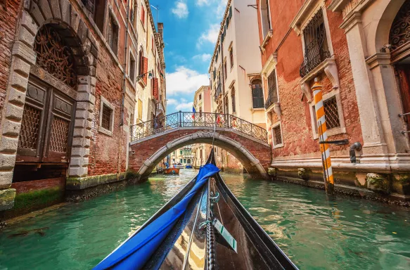 View from gondola during the ride through the canals in Venice, Italy.