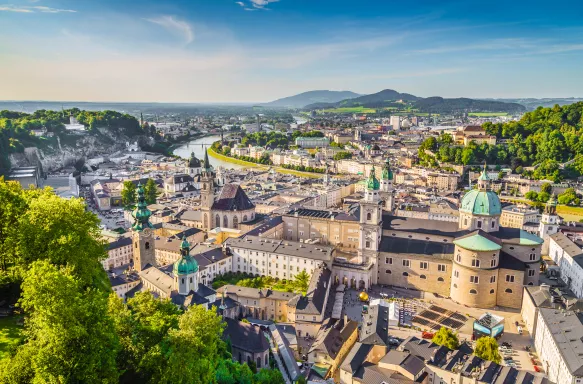 Aerial view of the historic city of Salzburg during sunset, Salzburger Land, Austria.