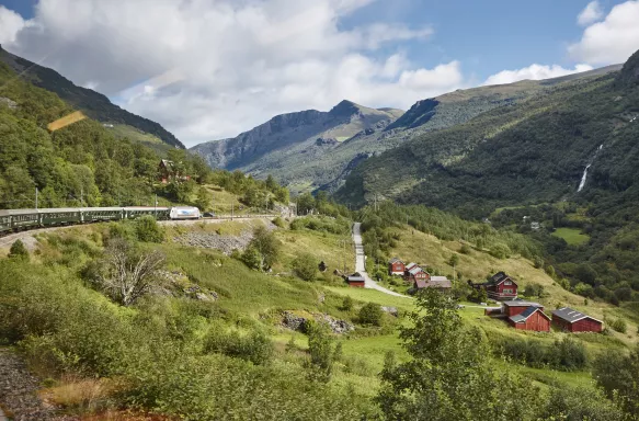 Landscape of Flam Railway amongst hills and vegetation in Norway