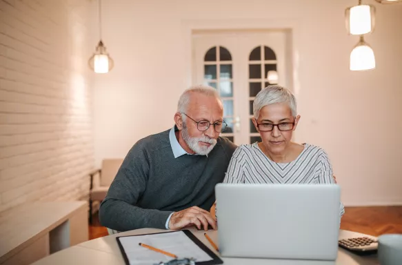 Senior couple browsing the internet together