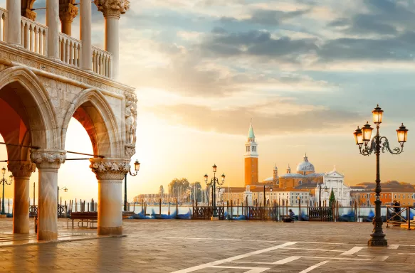 St. Mark's San Marco square with San Giorgio Maggiore church at sunrise in Venice, Italy