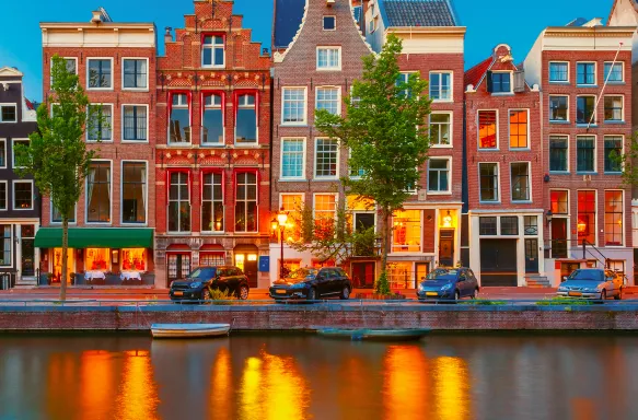 Traditional Dutch houses overlooking Herengracht canal in Holland, Netherlands