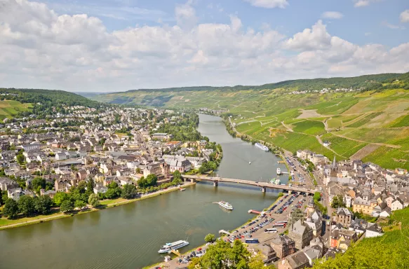 View from Landshut Castle to the old town Bernkastel-Kues with vineyards and river Mosel in summer, Germany Europe