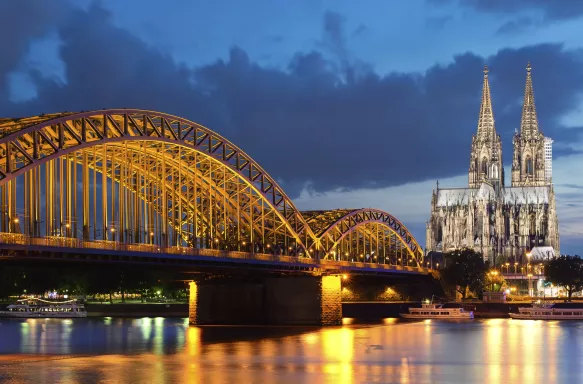 Panorama of Cologne city and Rhine River at night, Germany